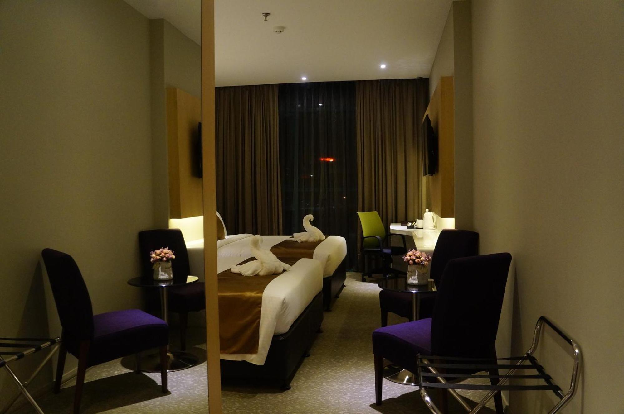 Greens Hotel & Suites Бинтулу Номер фото